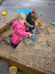 We've made layered  cakes in the sandpit.